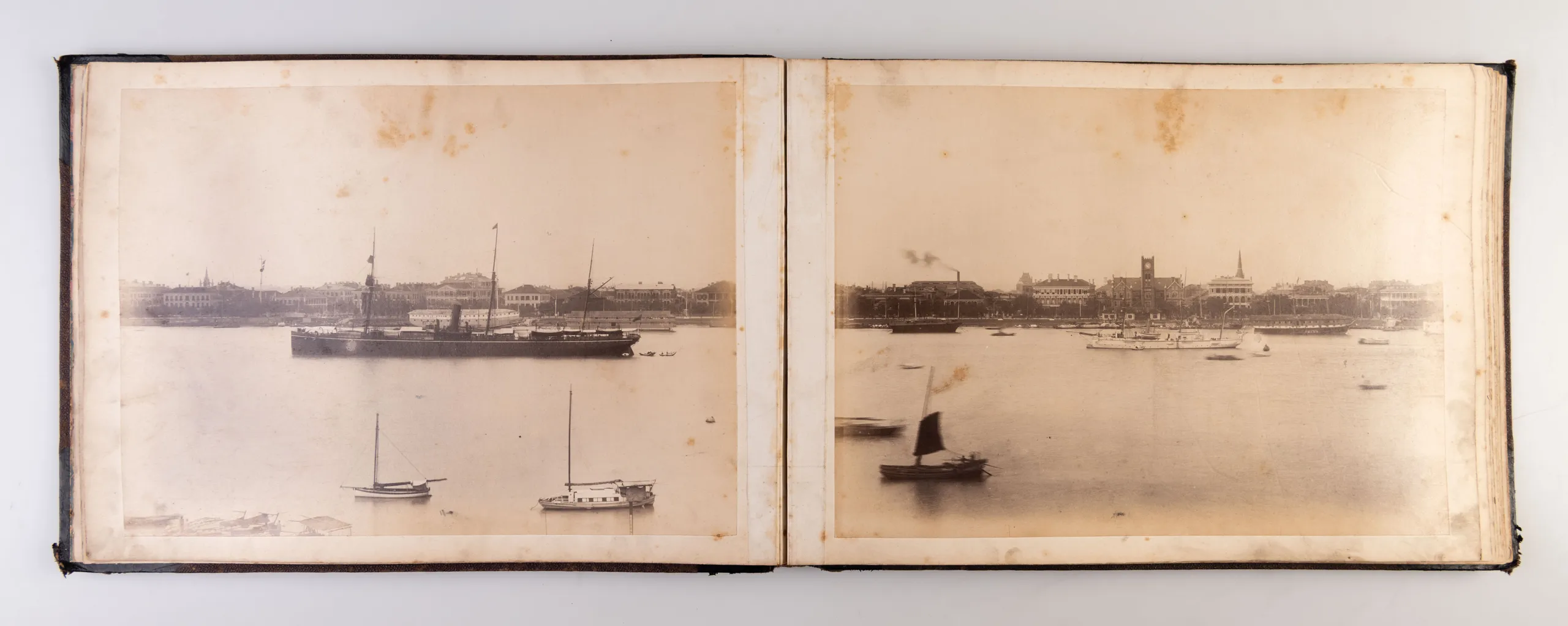 An album of 24 photographs of Shanghai and Peking.