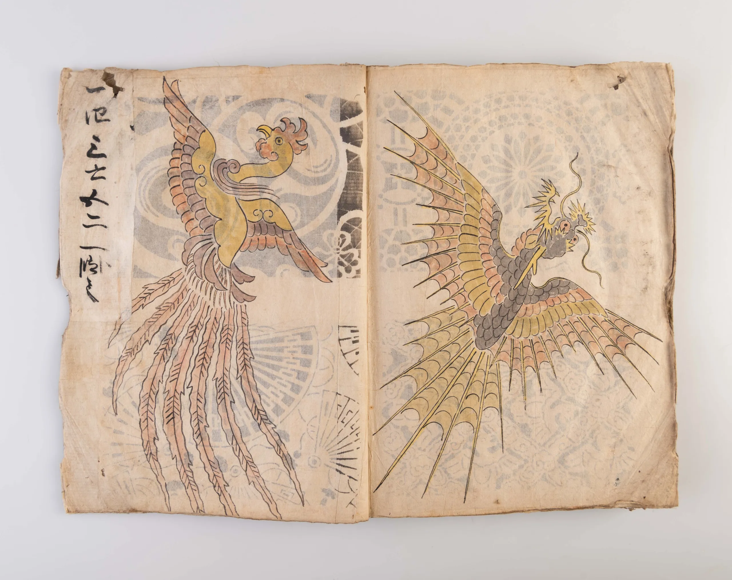 A collection of three weaving pattern scrapbooks, including Orimono kodai zu [Album of antique woven textile designs]