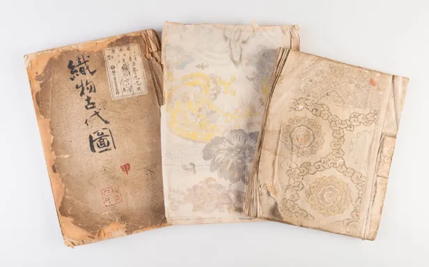 A collection of three weaving pattern scrapbooks, including Orimono kodai zu [Album of antique woven textile designs]