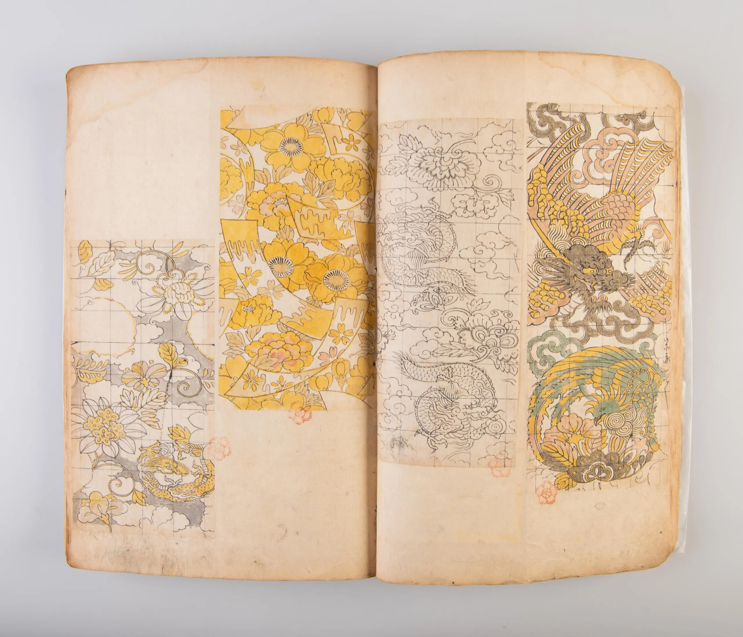 A collection of three weaving pattern scrapbooks, including Orimono kodai zu [Album of antique woven textile designs]