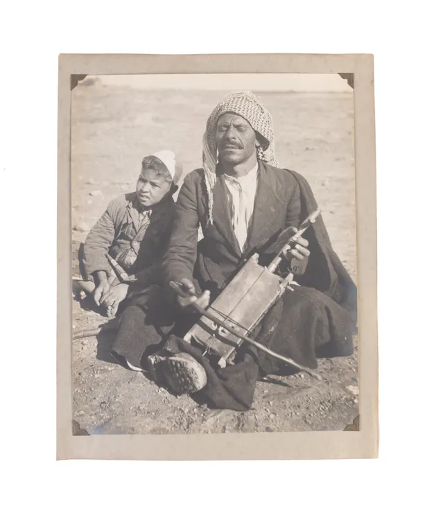 Portfolio of photographs of Iraqi views and people.