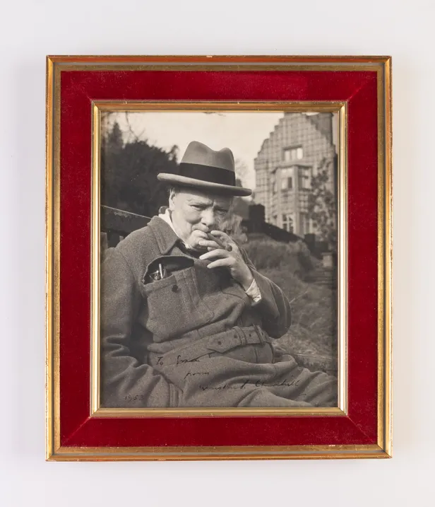 Inscribed photographic portrait of Winston Churchill by Hans Wild.